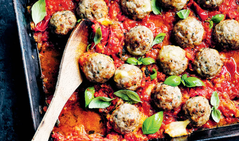 FROM EVEN MORE BASICS TO BRILLIANCE BOCCONCINI-STUFFED MEATBALLS WITH ROASTED TOMATO SAUCE