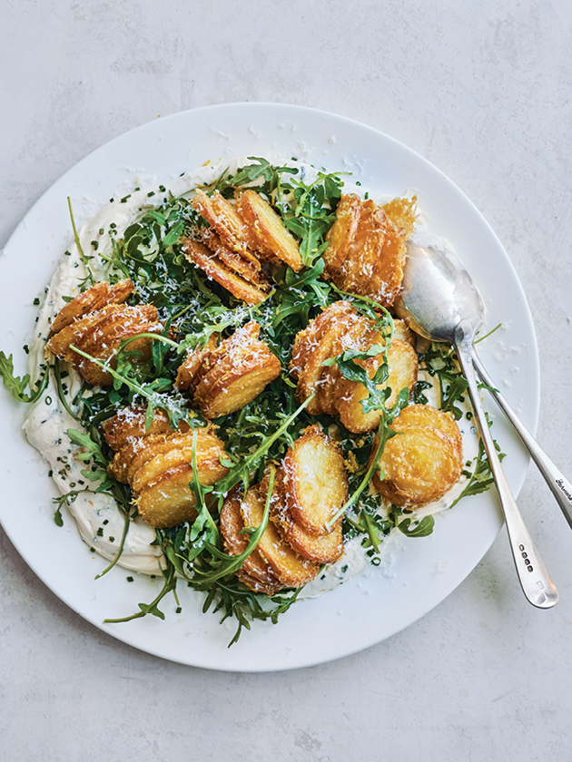 CROWD FAVOURITE CRISPY PARMESAN-CRUSTED POTATO AND ROCKET SALAD