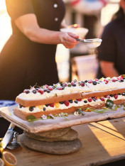 almond sponge cake with raspberry cream and whipped white chocolate ganache