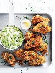 crispy quinoa rooster wings with celery and cabbage slaw
