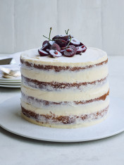 pistachio cake with cherry compote and cream cheese icing